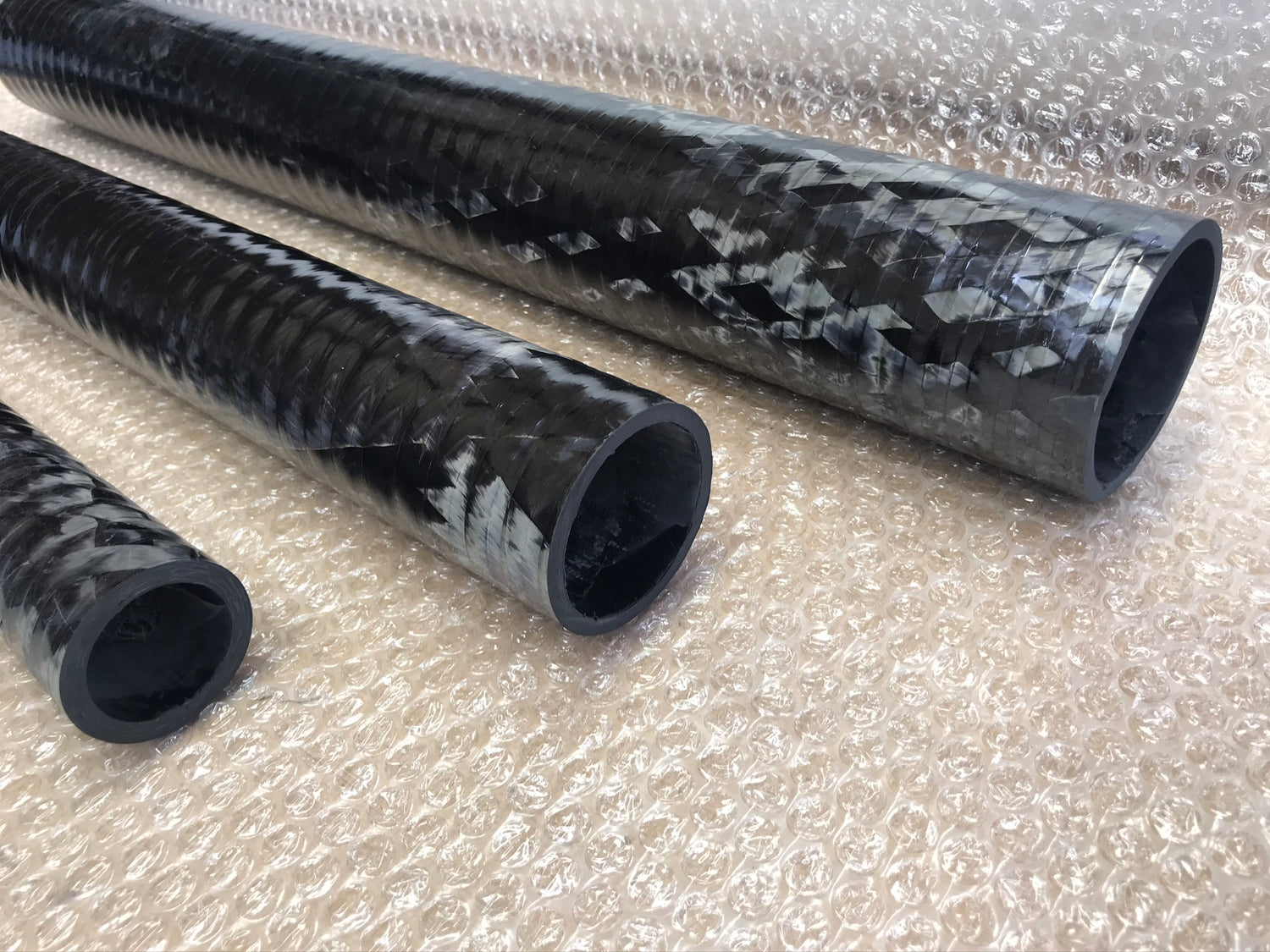 Filament wound carbon fibre tubes