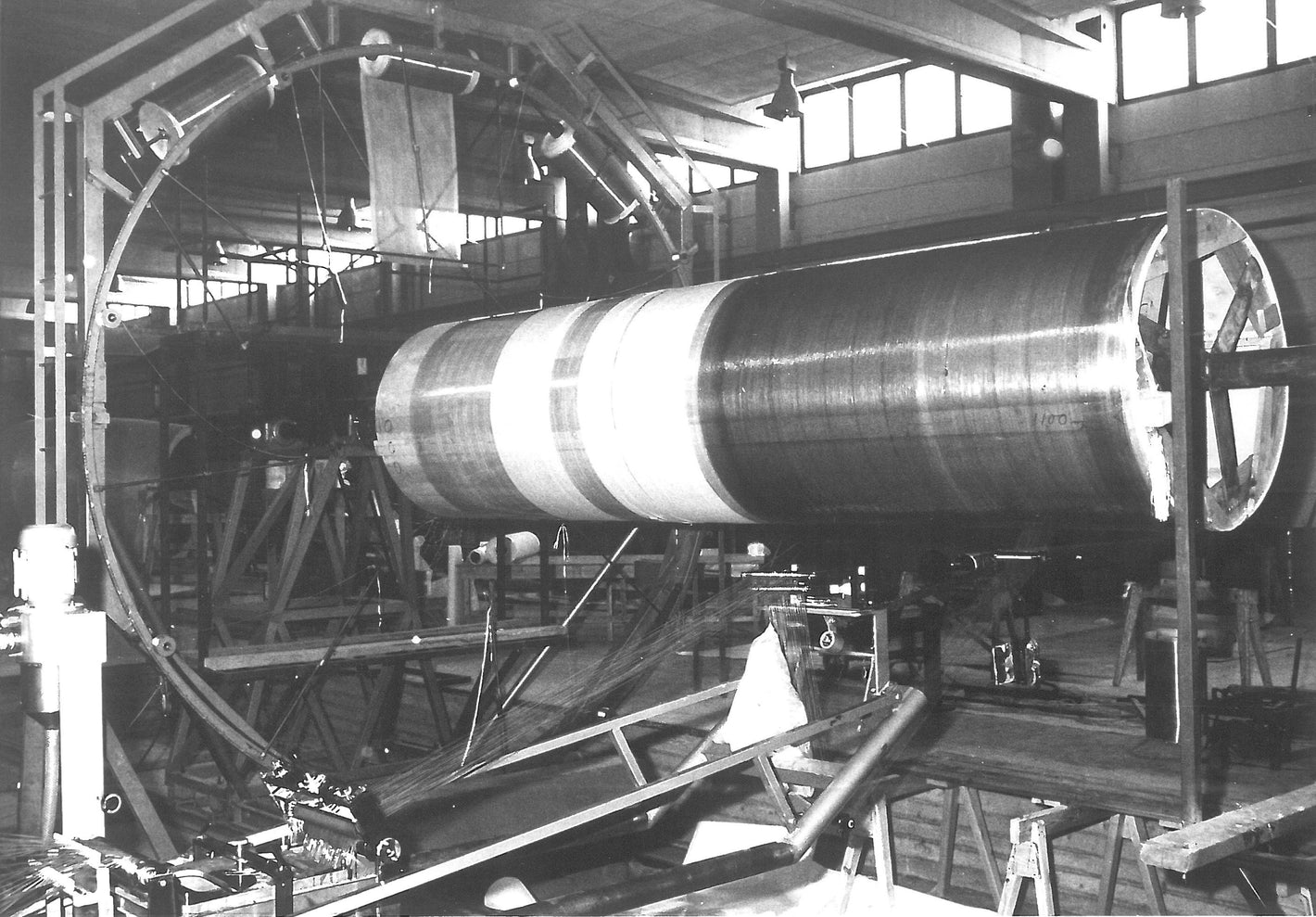 A black and white photo of composites weaving when the technology was quite new